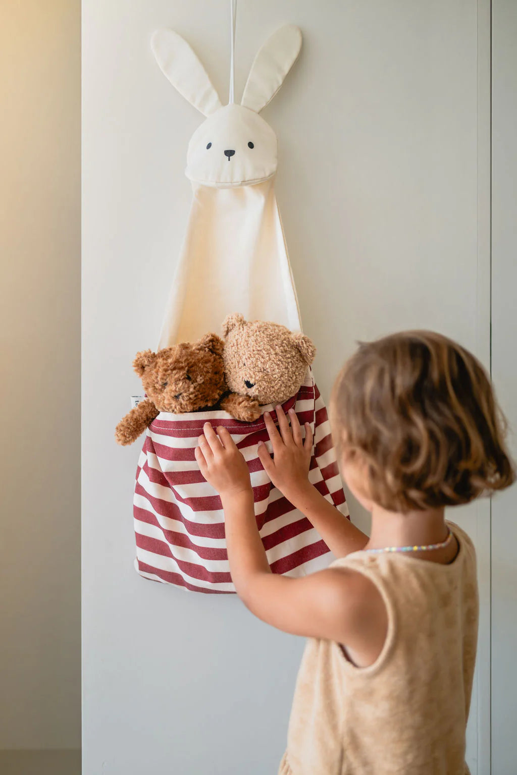 Toto “bunny” | by play&go® | Speelse 2-in-1 wandopberger & draagtas