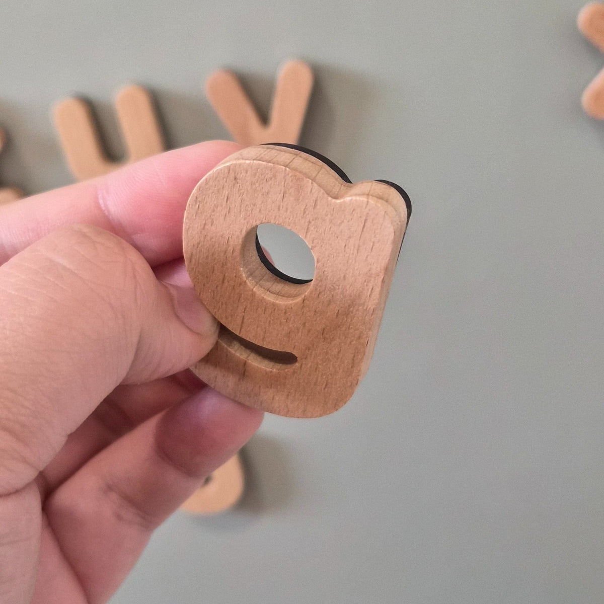 Magnetische houten alfabet